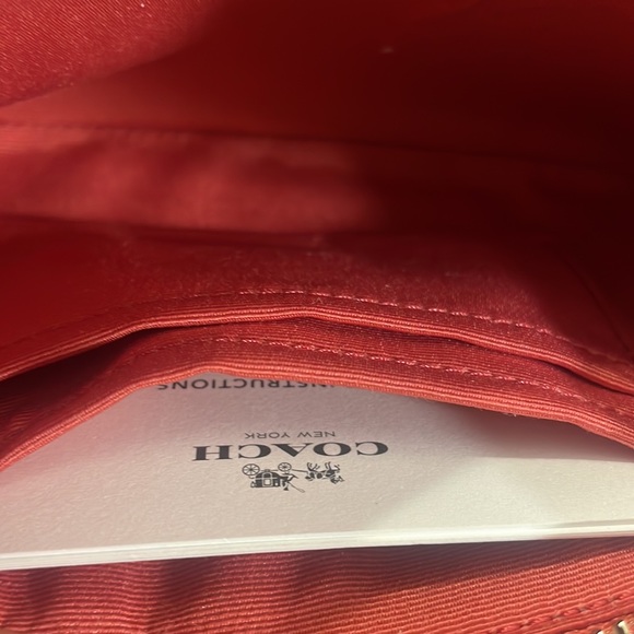 NWT Coach Wristlet raised C’s in strawberry color - Picture 6 of 7